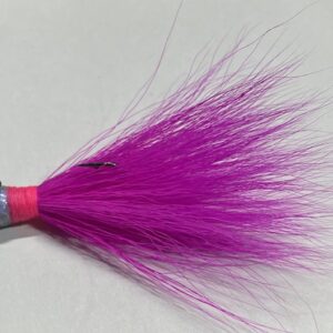 Hot pink buck tail fishing lure