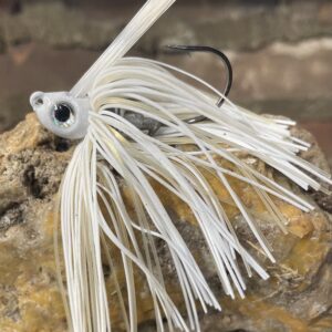Gold and white swim jig fishing lure