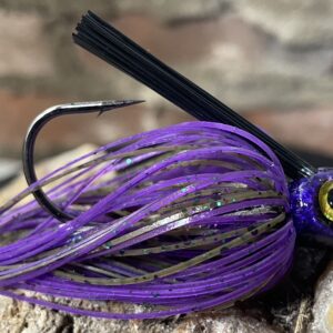 Purple swim jig fishing lure