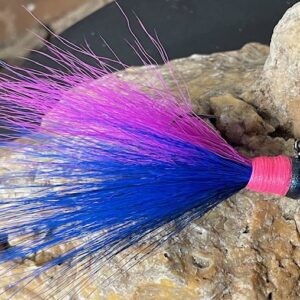 pink and blue bucktail fishing lure