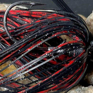 Black and red shad fishing lure